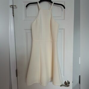 Cream/off-white high neck flowy women’s knee-length dress. Size S. Worn once.